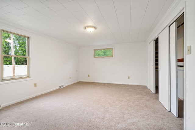 16 Smith Ln, East Greenbush, NY 12144 - unfurnished bedroom featuring carpet, crown molding, and baseboards