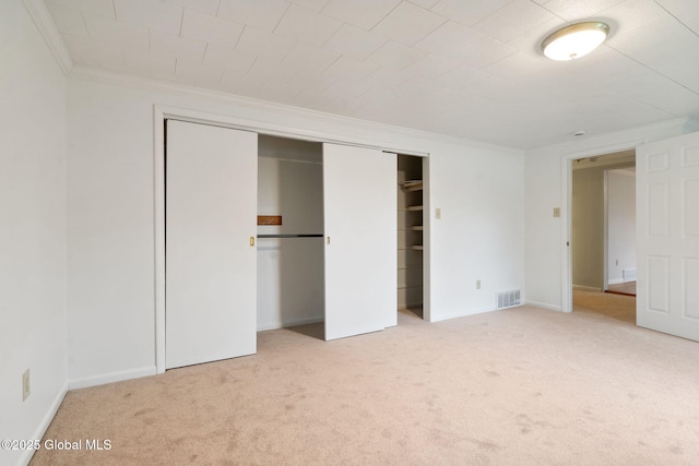 16 Smith Ln, East Greenbush, NY 12144 - unfurnished bedroom with crown molding, light colored carpet, a closet, and baseboards