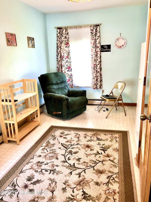 607 Gansevoort Rd, Moreau, NY 12803 - living area with tile patterned floors and baseboards