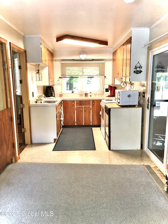 607 Gansevoort Rd, Moreau, NY 12803 - kitchen with white appliances, ornamental molding, light countertops, brown cabinets, and a sink