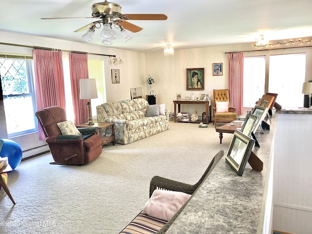 607 Gansevoort Rd, Moreau, NY 12803 - living room featuring baseboard heating, carpet floors, and ceiling fan