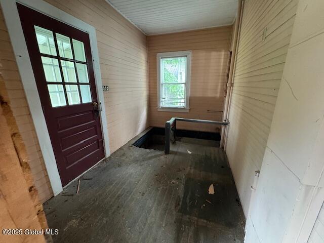 257 Main St, Johnsburg, NY 12853 - doorway featuring wood walls and wood-type flooring