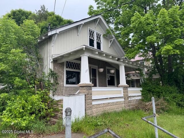 257 Main St, Johnsburg, NY 12853 - view of front of house featuring a porch