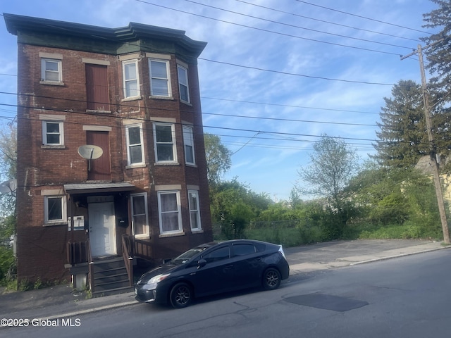 869 Strong St, Schenectady, NY 12307 - view of front of house featuring brick siding