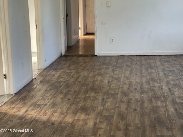 869 Strong St, Schenectady, NY 12307 - unfurnished room with dark wood-type flooring and baseboards
