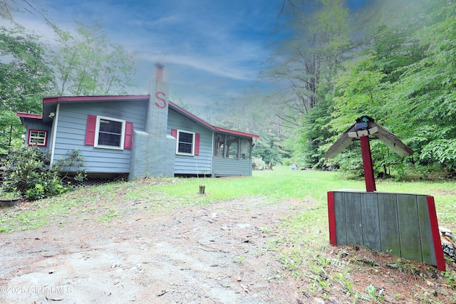 68 Elks Glade Rd, Chester, NY 12817 - view of property exterior featuring a sunroom
