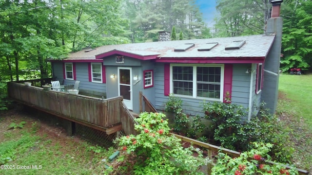 68 Elks Glade Rd, Chester, NY 12817 - view of front facade with a chimney and a deck