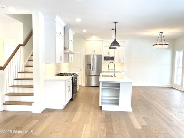 1 Jennifer Ln, Milton, NY 12020 - kitchen with appliances with stainless steel finishes, a sink, light wood-type flooring, light countertops, and recessed lighting