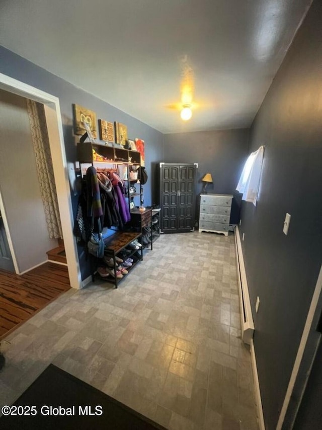13 Hawk St, Amsterdam, NY 12010 - mudroom with a baseboard radiator and baseboards