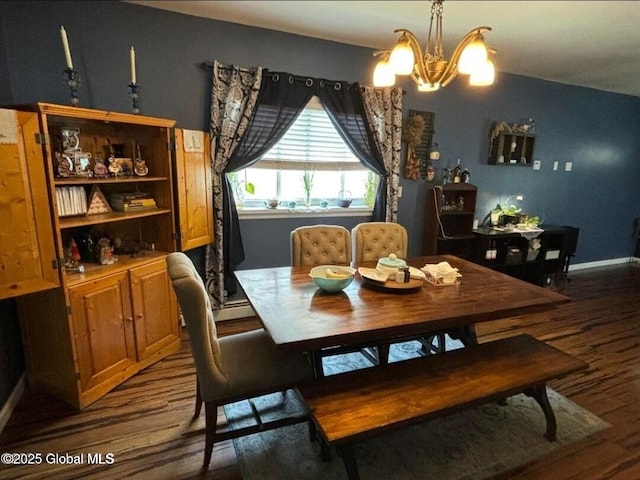 13 Hawk St, Amsterdam, NY 12010 - dining space featuring dark wood-style floors, a chandelier, and baseboards