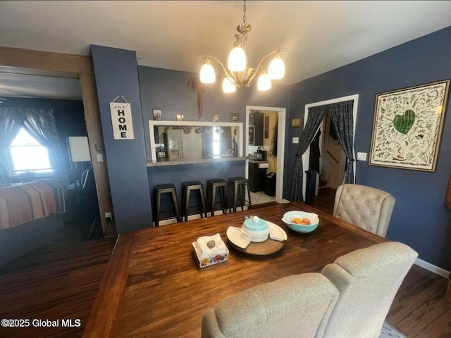 13 Hawk St, Amsterdam, NY 12010 - dining space featuring a chandelier and wood finished floors