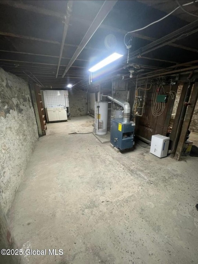 13 Hawk St, Amsterdam, NY 12010 - unfinished below grade area with water heater and heating unit