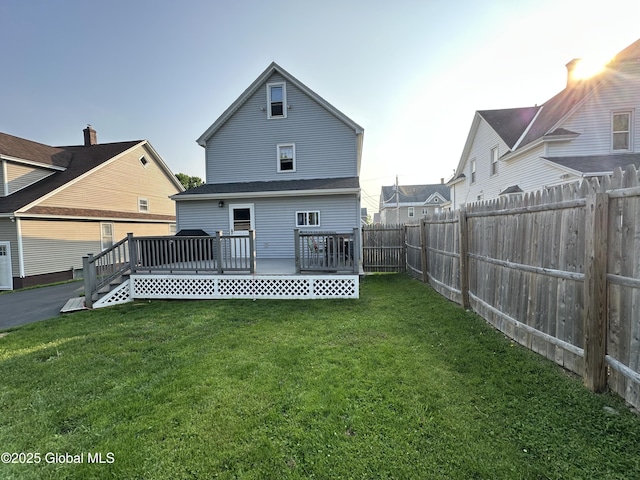 13 Hawk St, Amsterdam, NY 12010 - back of property with a deck