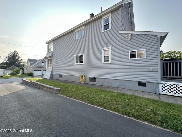 13 Hawk St, Amsterdam, NY 12010 - view of side of home featuring a chimney