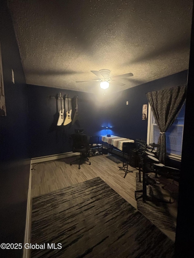 13 Hawk St, Amsterdam, NY 12010 - bedroom with a textured ceiling, wood finished floors, and ceiling fan