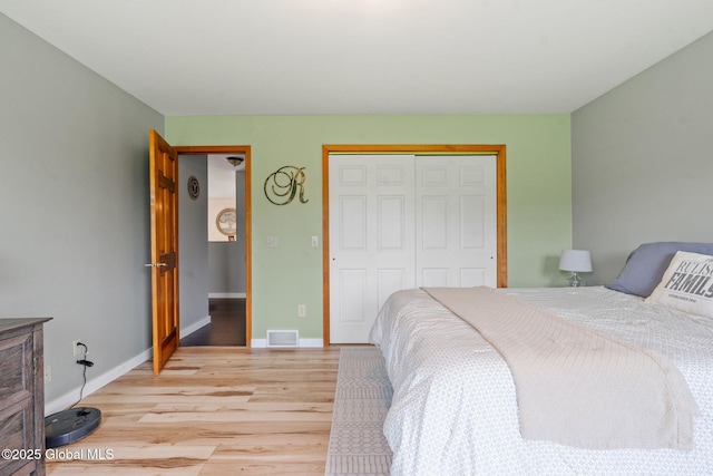 1396 Barton Hill Rd, Wright, NY 12053 - bedroom with light wood-style flooring, a closet, and baseboards
