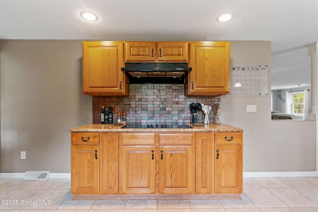 1396 Barton Hill Rd, Wright, NY 12053 - kitchen featuring ventilation hood, baseboards, backsplash, black electric cooktop, and light stone counters