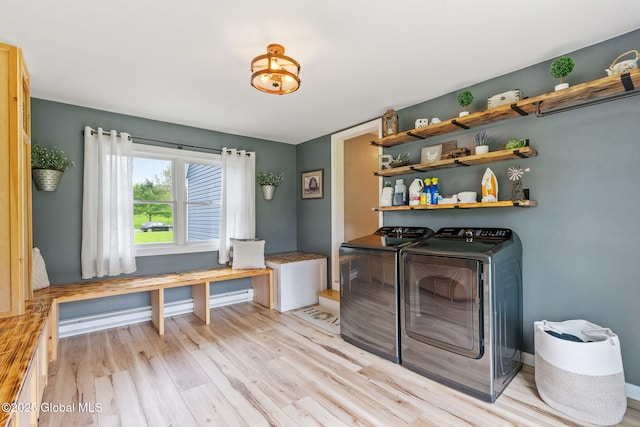 1396 Barton Hill Rd, Wright, NY 12053 - laundry area with washer and clothes dryer, light wood-style flooring, and baseboards