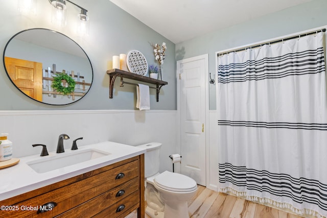 1396 Barton Hill Rd, Wright, NY 12053 - bathroom featuring wainscoting, vanity, toilet, wood finished floors, and curtained shower