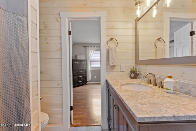 1396 Barton Hill Rd, Wright, NY 12053 - full bath featuring vanity, toilet, wood finished floors, and wooden walls
