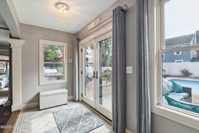 195 W Circular St, Saratoga Springs, NY 12866 - doorway to outside featuring a chandelier and french doors