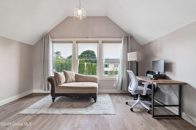 195 W Circular St, Saratoga Springs, NY 12866 - home office featuring vaulted ceiling, wood finished floors, and a chandelier