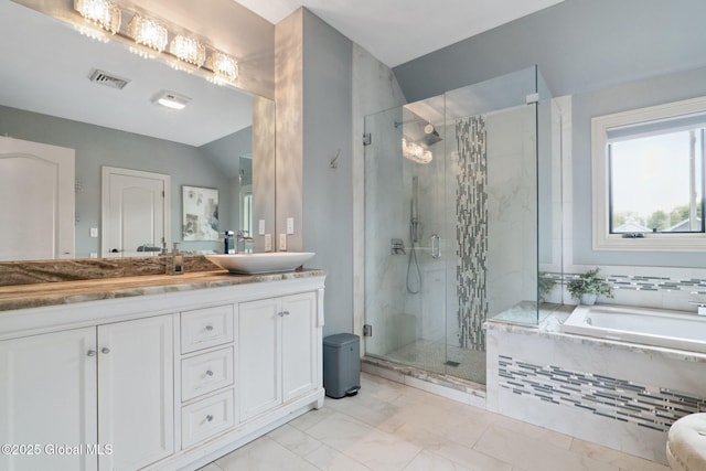 195 W Circular St, Saratoga Springs, NY 12866 - bathroom featuring a garden tub, vanity, a stall shower, marble finish flooring, and lofted ceiling