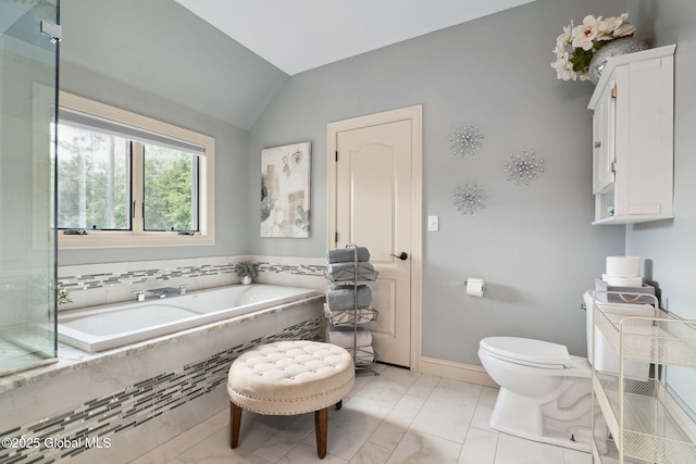 195 W Circular St, Saratoga Springs, NY 12866 - bathroom with lofted ceiling, a relaxing tiled tub, and marble finish floors