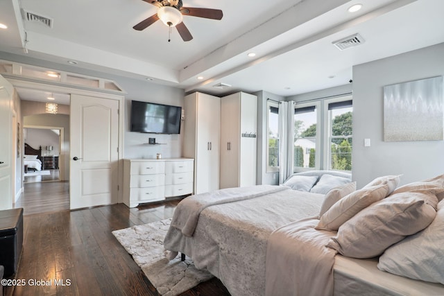 195 W Circular St, Saratoga Springs, NY 12866 - bedroom featuring dark wood-type flooring, recessed lighting, and a tray ceiling
