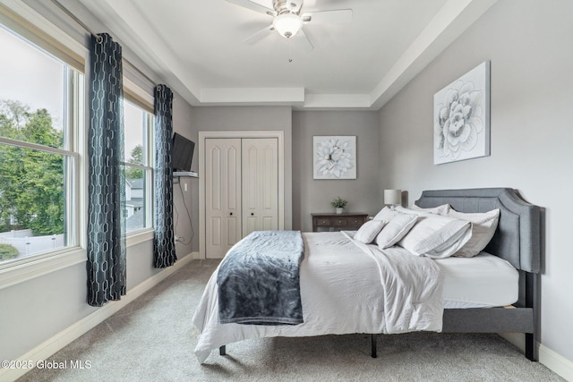 195 W Circular St, Saratoga Springs, NY 12866 - bedroom with carpet floors, a closet, a raised ceiling, and ceiling fan