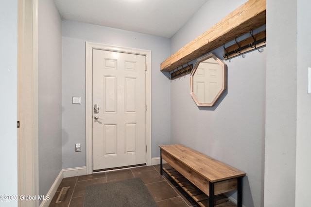 195 W Circular St, Saratoga Springs, NY 12866 - mudroom with dark tile patterned flooring and baseboards