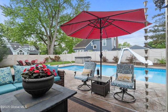 195 W Circular St, Saratoga Springs, NY 12866 - view of pool featuring a water slide, a fenced backyard, and a patio