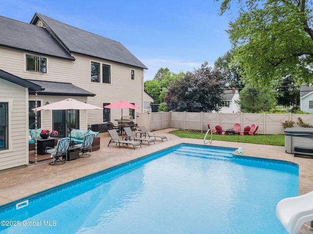 195 W Circular St, Saratoga Springs, NY 12866 - view of pool featuring a patio area, a fenced backyard, a water slide, and an outdoor hangout area