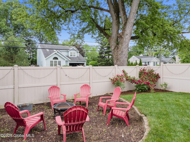 195 W Circular St, Saratoga Springs, NY 12866 - fenced backyard featuring a fire pit