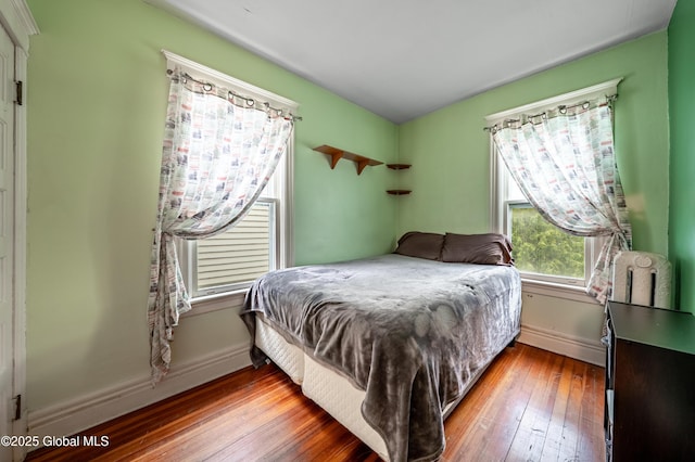 58 N Allen St, Albany, NY 12203 - bedroom featuring hardwood / wood-style floors and baseboards