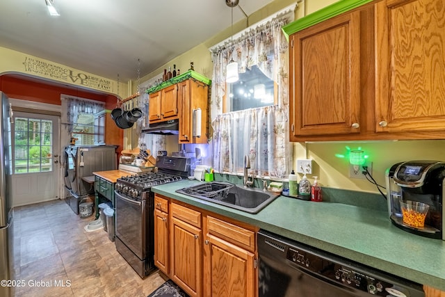58 N Allen St, Albany, NY 12203 - kitchen with black appliances, a sink, under cabinet range hood, and brown cabinetry