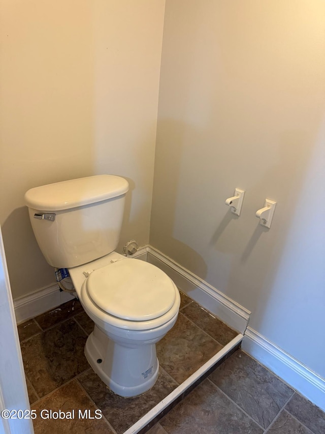 311 Old Loudon Rd, Colonie, NY 12110 - bathroom with toilet and baseboards