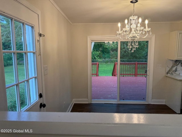311 Old Loudon Rd, Colonie, NY 12110 - doorway with wood finished floors, a chandelier, crown molding, and baseboards