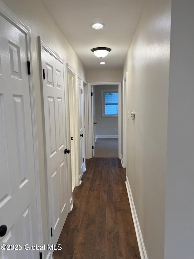 311 Old Loudon Rd, Colonie, NY 12110 - corridor featuring dark wood-style flooring and baseboards