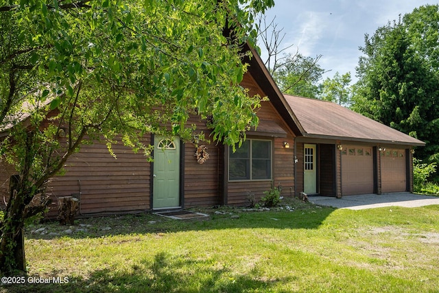 904 Ashgrove Rd, White Creek, NY 12816 - view of front of home with a garage, a front yard, and driveway
