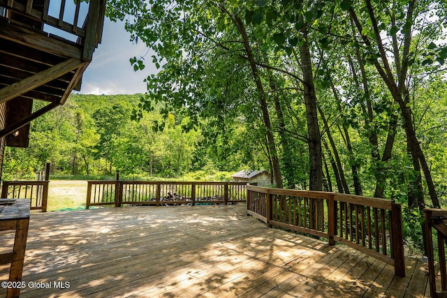 904 Ashgrove Rd, White Creek, NY 12816 - wooden terrace featuring a wooded view