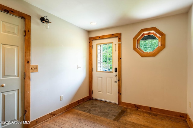 904 Ashgrove Rd, White Creek, NY 12816 - foyer entrance featuring dark wood finished floors and baseboards