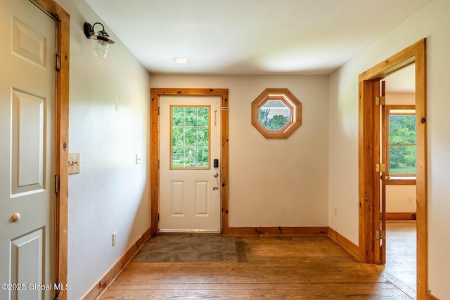 904 Ashgrove Rd, White Creek, NY 12816 - entrance foyer with hardwood / wood-style flooring, plenty of natural light, and baseboards