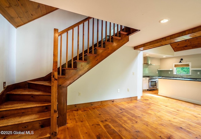 904 Ashgrove Rd, White Creek, NY 12816 - stairs with hardwood / wood-style flooring, recessed lighting, wood ceiling with exposed beams, and baseboards