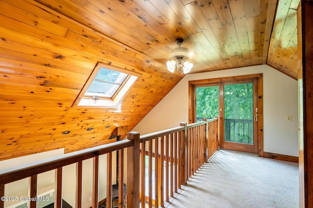 904 Ashgrove Rd, White Creek, NY 12816 - hallway featuring a skylight, wood ceiling, lofted ceiling, carpet flooring, and baseboards