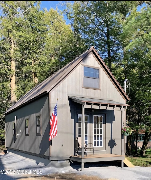 85 Hunt Lake Rd, Corinth, NY 12822 - view of front of house with french doors
