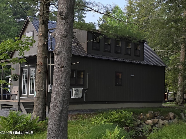 85 Hunt Lake Rd, Corinth, NY 12822 - view of side of property with a cooling unit and metal roof