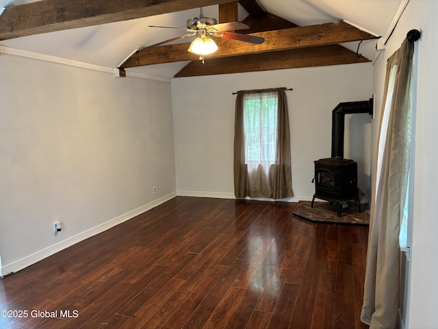 1922 Regent St, Niskayuna, NY 12309 - unfurnished living room with a wood stove, a ceiling fan, and dark wood-style flooring