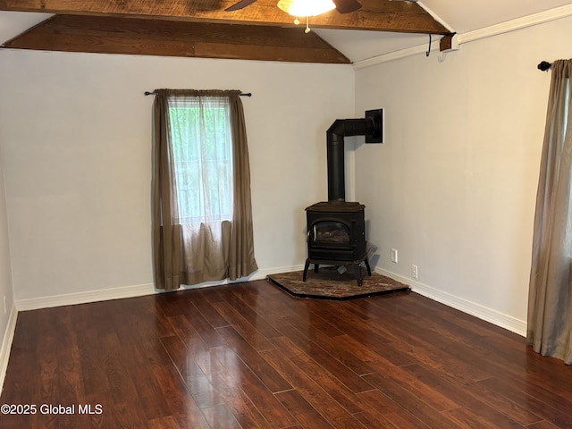 1922 Regent St, Niskayuna, NY 12309 - unfurnished living room with a ceiling fan, a wood stove, and wood finished floors