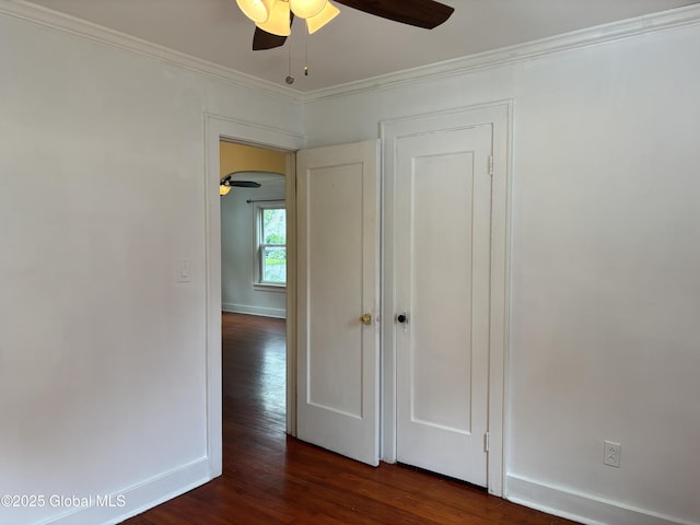 1922 Regent St, Niskayuna, NY 12309 - unfurnished room with ceiling fan, crown molding, dark wood-style flooring, and arched walkways